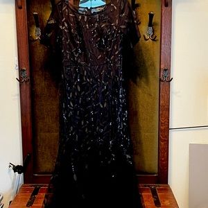 Formal Dress . Size large but runs small. More like 6/8. Never worn. $40.